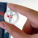 Illustration for article titled GPS Coin Is Spare Change That's Actually Worth Something